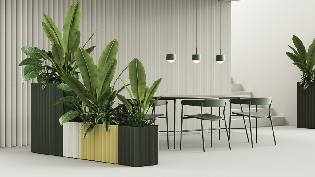 Tess planters and tall foliage create a natural space divider in an open office setting